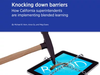 Cover artwork that reads: Knocking down barriers, How California superintendents are implementing blended learning, showing a hammer next to a tablet with chains and a lock around it
