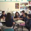 Photo of group of students working together at a table
